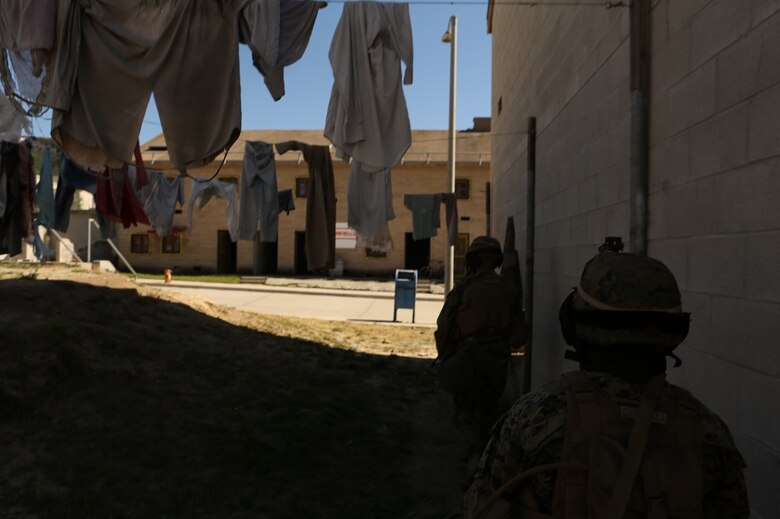 Marines with 1st Marine Division participate in a three-week urban operations course led by 1st Marine Division Schools, Urban Leaders Course at Camp Pendleton March 8, 2016. During the course, unit leaders cover urban terrain tactics like combat marksmanship, dynamic breaching, close quarters battle and room clearing. (U.S. Marine Corps photo by Lance Cpl. Justin E. Bowles/ Released)