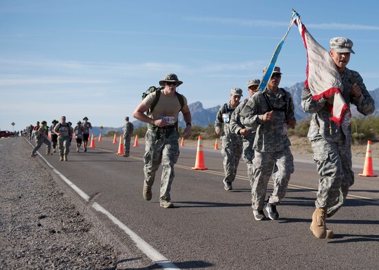 Participants in the 2016 Bataan Memorial Death March make their way through the course at White Sands Missile Range N.M., March 20. Over 6,200 participants came to honor more than 76,000 Prisoners of War and Missing in Action from Bataan and Corregidor during World War II. The 26.2-mile course starts on WSMR, enters hilly terrain and finishes through sandy desert trails, with elevation ranging from 4,100 to 5,300 feet. (U.S. Air Force photo by Senior Airman Chase Cannon)