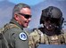 U.S. Air Force Major Gen. William Binger, left, talks to Staff Sgt. Shawn McBee, a 305th Rescue Squadron special mission aviator, on the flight line at Davis-Monthan Air Force Base, Ariz., March 9. Binger visited the 943rd Rescue Group to see its combat search and rescue mission firsthand. He is the Mobilization Assistant to the Deputy Chief of Staff for Operations, Headquarters U.S. Air Force, Washington, D.C. (U.S. Air Force photo by Carolyn Herrick)
