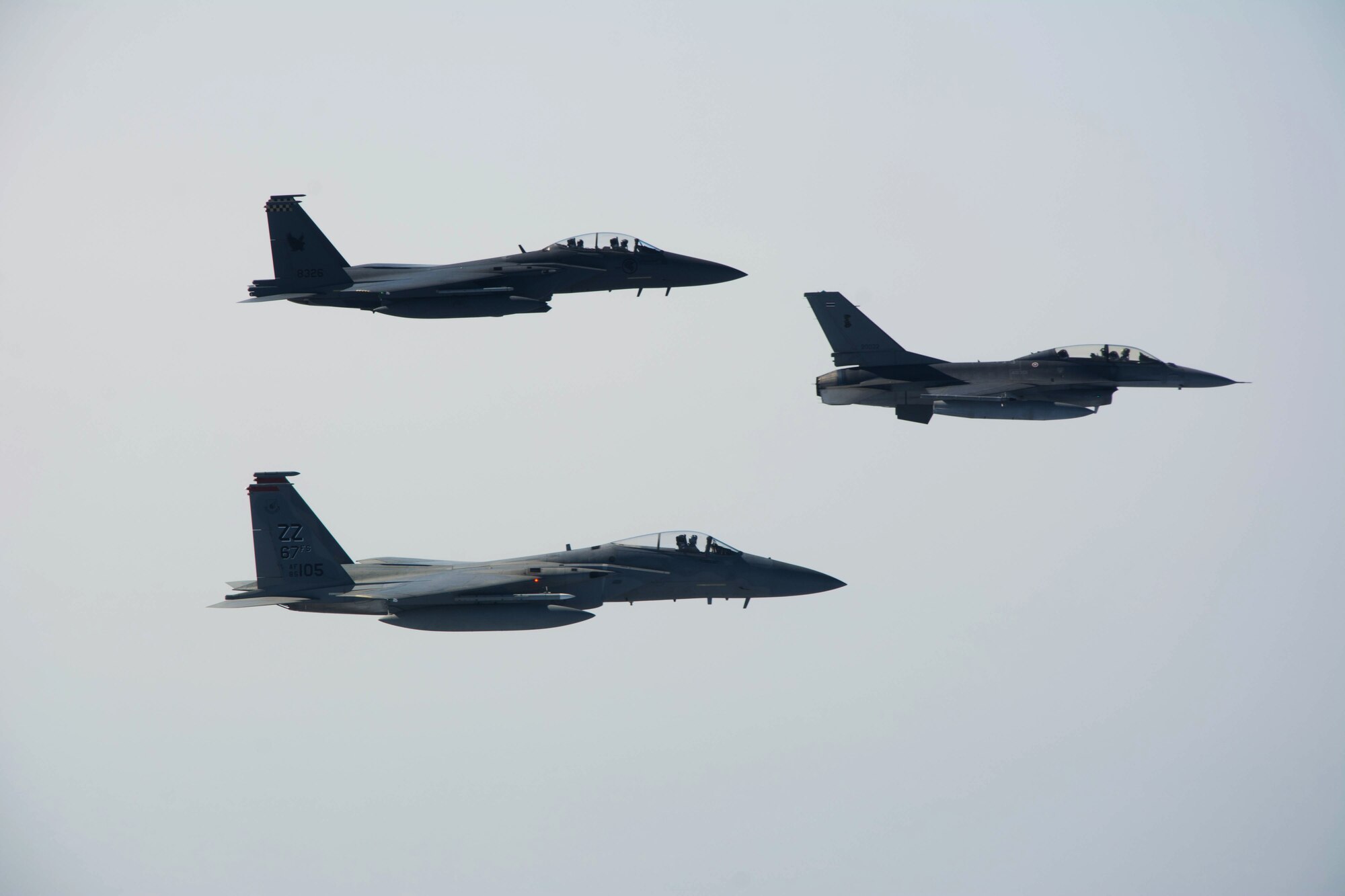 A U.S. Air Force F-15 Eagle from 67th Fight Squadron at Kadena Air Base, Japan, flies in formation with a Royal Thai Air Force F-16 and a Singapore Air Force F-15 Eagle during Exercise Cope Tiger 16, near Korat Royal Thai Air Force Base, Thailand, March 17, 2016. The multilateral exercise involved a combined total of 87 aircraft that completed 1,003 sorts of a two week period. Exercise Cope Tiger 16 included over 1,200 personnel from three countries and continues the growth of strong, interoperable and beneficial relationships within the Asia-Pacific region, while demonstrating U.S. capability to project forces strategically in a combined, joint environment. (Courtesy photo)