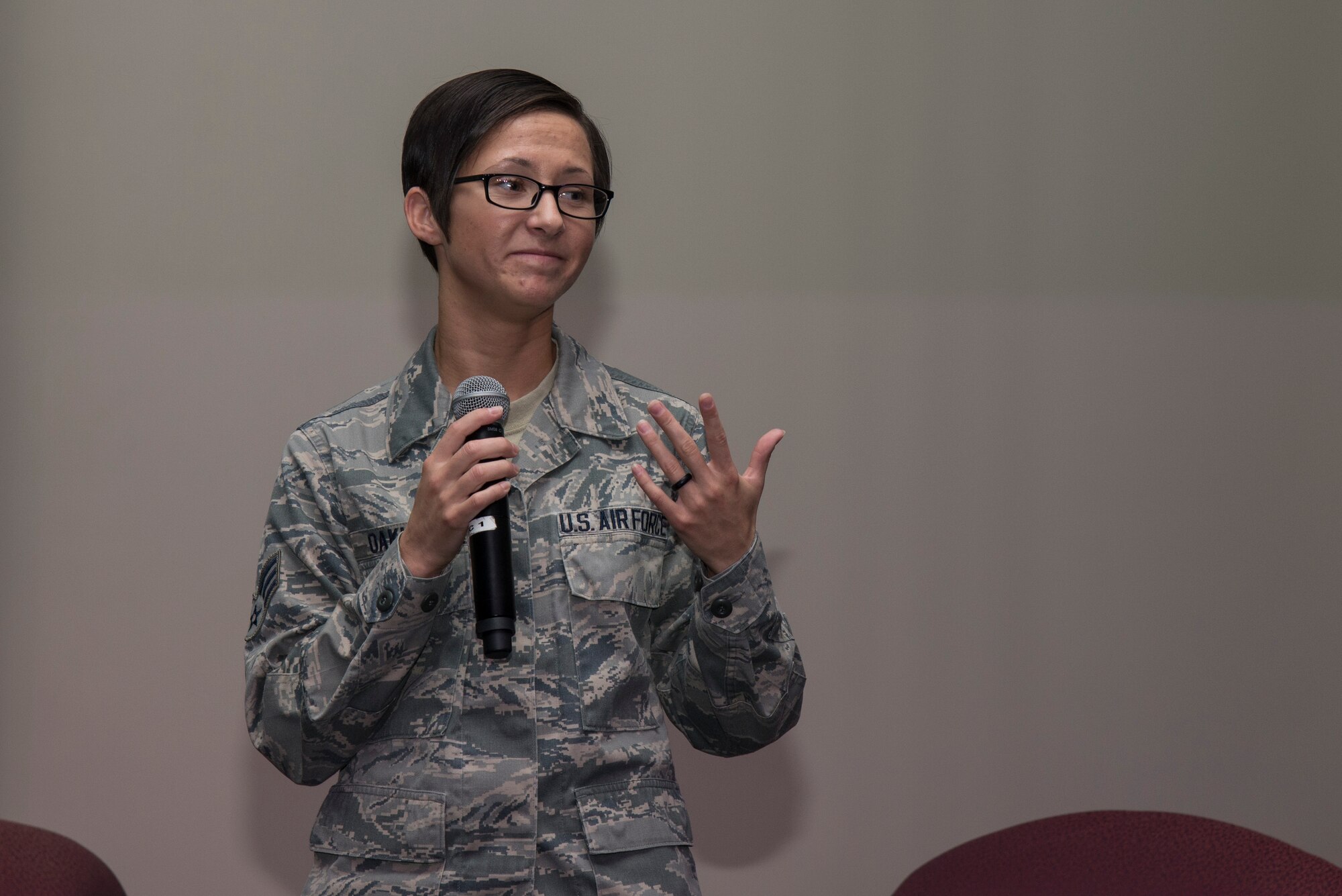 Senior Airman Nikitta Oakley, 15th Operational Weather Squadron weather forecaster, speaks about overcoming an Article 15 for underage drinking early in her career, during the Storytellers event Mar. 15 at the Scott Event Center at Scott Air Force Base, Ill. Storytellers in a less formal setting where speakers can tell their stories of perseverance and resiliency. (U.S. Air Force Photo by Airman Daniel Garcia)
