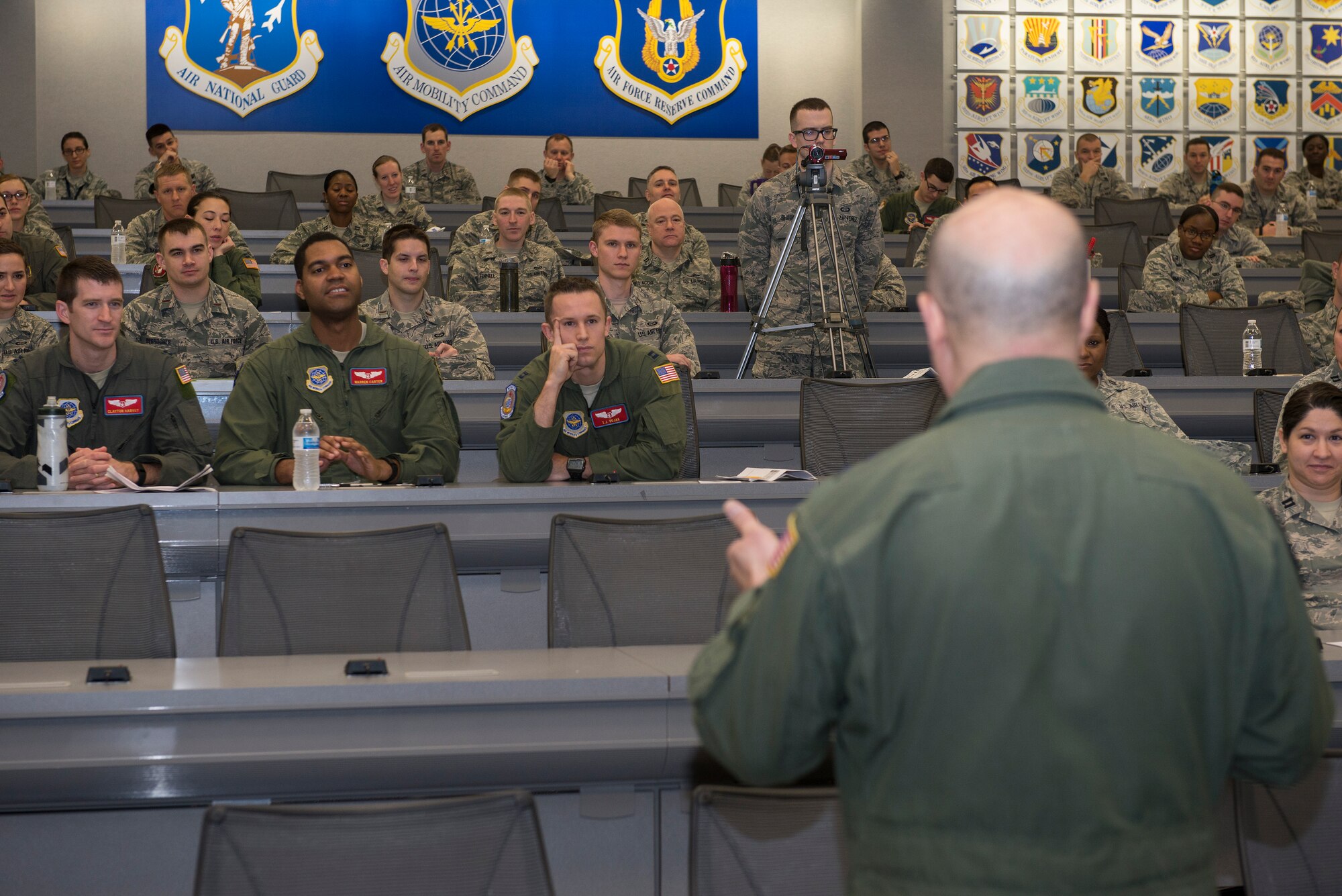 The Company Grade Officers listen intently as Maj. Gen. Giovanni Tuck, U.S. Transportation Command, answers questions about what the biggest challenges CGOs face in today’s Air Force during the CGOC March 15, 2016 at Scott Air Force Base, Ill. The theme of this year’s conference was “Synergy: Total Force Leadership.” (U.S. Air Force Photo/Senior Airman Joshua Eikren)