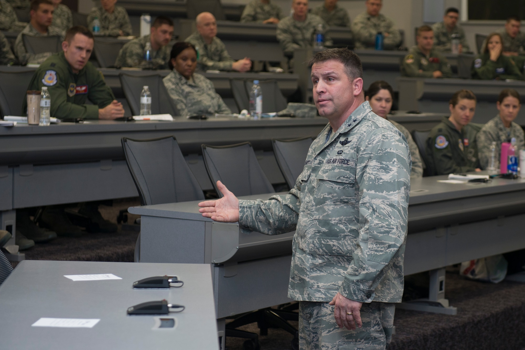 Maj. Gen. Thomas Sharpy, Air Mobility Command, talks to Company Grade Officers about their future in the Air Force and how they can succeed March 16, 2016 at the CGOC. The CGOC was open to all CGOs from Scott AFB, Fort Leonard Wood, Fort Campbell, Whiteman AFB and all ROTC detachments from surrounding schools and recruiting squadrons. (U.S. Air Force Photo/Senior Airman Joshua Eikren)