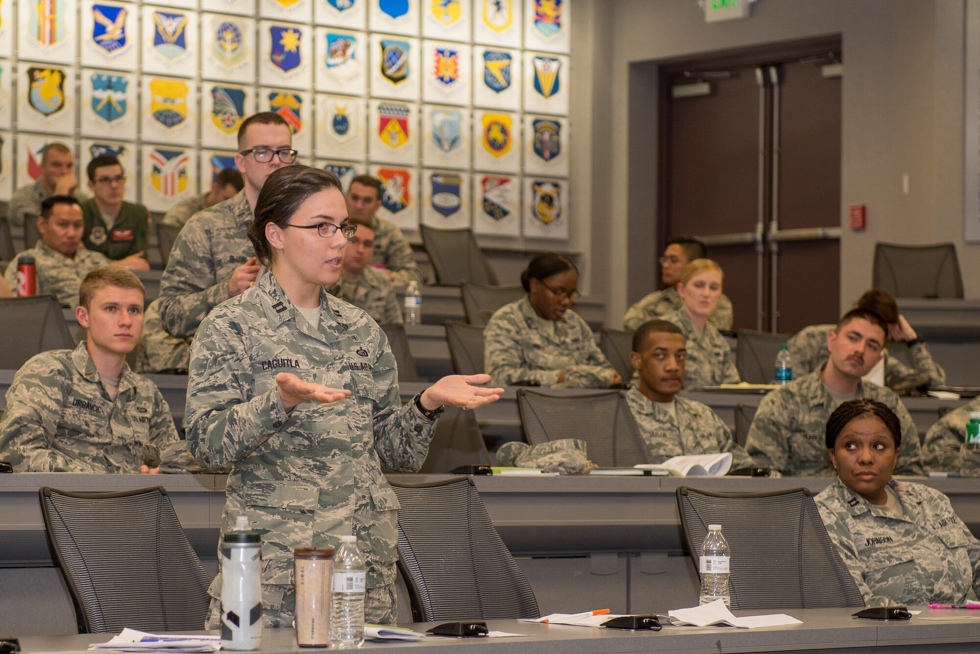 Capt. Tiffany Caguitla, 375th Aeromedical Evacuation Squadron, directs a question to the Progressive Discipline Panel during the CGOC March 15, 2016 at Scott Air Force Base, Ill. The CGOC brought in 119 Company Grade Officers from Scott AFB, Fort Leonard Wood, Fort Campbell, Whiteman AFB and all ROTC detachments from surrounding schools and recruiting squadrons. (U.S. Air Force Photo/Senior Airman Joshua Eikren)