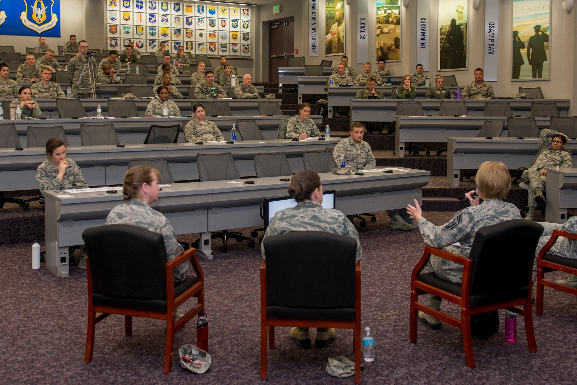 Chief Master Sgt. Virginia Storm, Air Mobility Command First Sergeant, informs the audience on the importance of documentation of discipline during the CGOC March 16, 2016 at Scott Air Force Base, Ill. The panel fielded questions and education the CGOs on responsibilities of their various jobs when an Airmen is given disciplinary action. (U.S. Air Force Photo/Senior Airman Joshua Eikren)