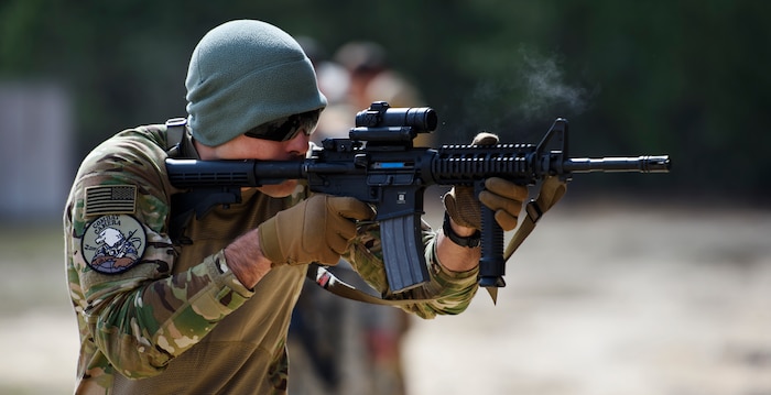 Senior Airman Benjamin Landon, Operating Location H combat videographer, performs shooting on the move training on Fort Jackson, S.C., March 5, 2016. Exercise Scorpion Lens is an annual Ability To Survive and Operate training evolution mandated by Air Force 3N0XX Job Qualification Standards (3N0XX AFJQS). Individuals are instructed using a “crawl, walk, run” format of training. The exercise is twofold containing the Scorpion Lens portion, dedicated to Advanced Weapons and Tactical Training (AWTT) and the Flash Bang portion dedicated to providing photography and videography documentation standards in combat situations. The purpose of the training is to provide refresher training to combat camera personnel of all ranks and skill levels in basic tactics, techniques, and procedures inherent to combat camera mission tasking. (U.S. Air Force photo by Senior Airman Clayton Cupit)