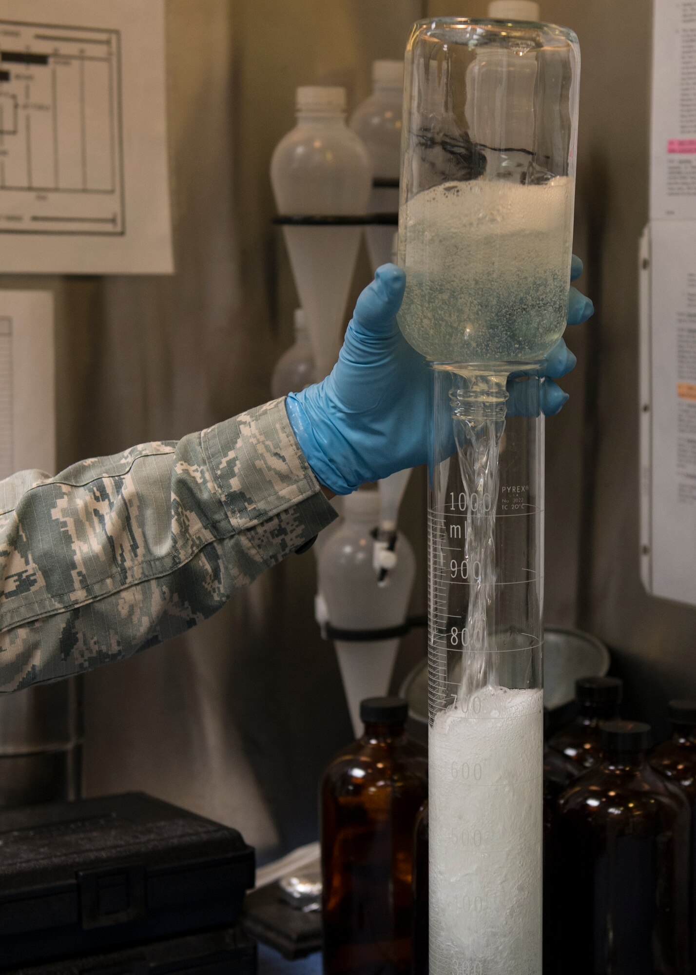 U.S. Air Force Senior Airman Jeremiah Garfoyle, a fuels laboratory technician assigned to the 733rd Logistics Readiness Squadron, pours fuel into a test tube at Langley Air Force Base, Va., March 18, 2016. After Garfoyle performs tests on fuel samples, which are sent to Wright-Patterson Air Force Base, Ohio, for more extensive testing. (U.S. Air Force photo by Airman 1st Class Derek Seifert)