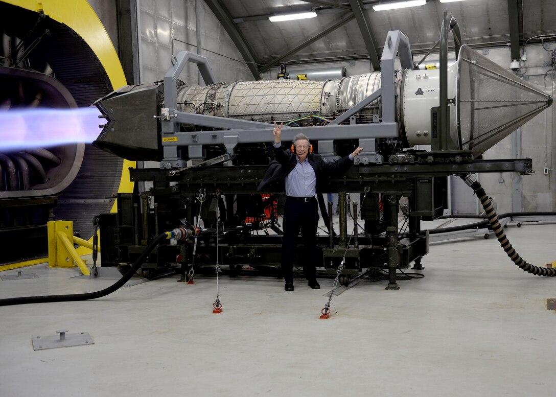 Retired U.S. Air Force Chief Master Sgt. of the Air Force Rodney J. McKinley holds on to an F-22 Raptor engine during a demonstration in the Hush House at Langley Air Force Base, Va., March 18, 2016. McKinley was introduced to the power of an F-22 Raptor engine and the newest technology that keeps them flying. (U.S. Air Force photo by Airman 1st Class Kaylee Dubois)