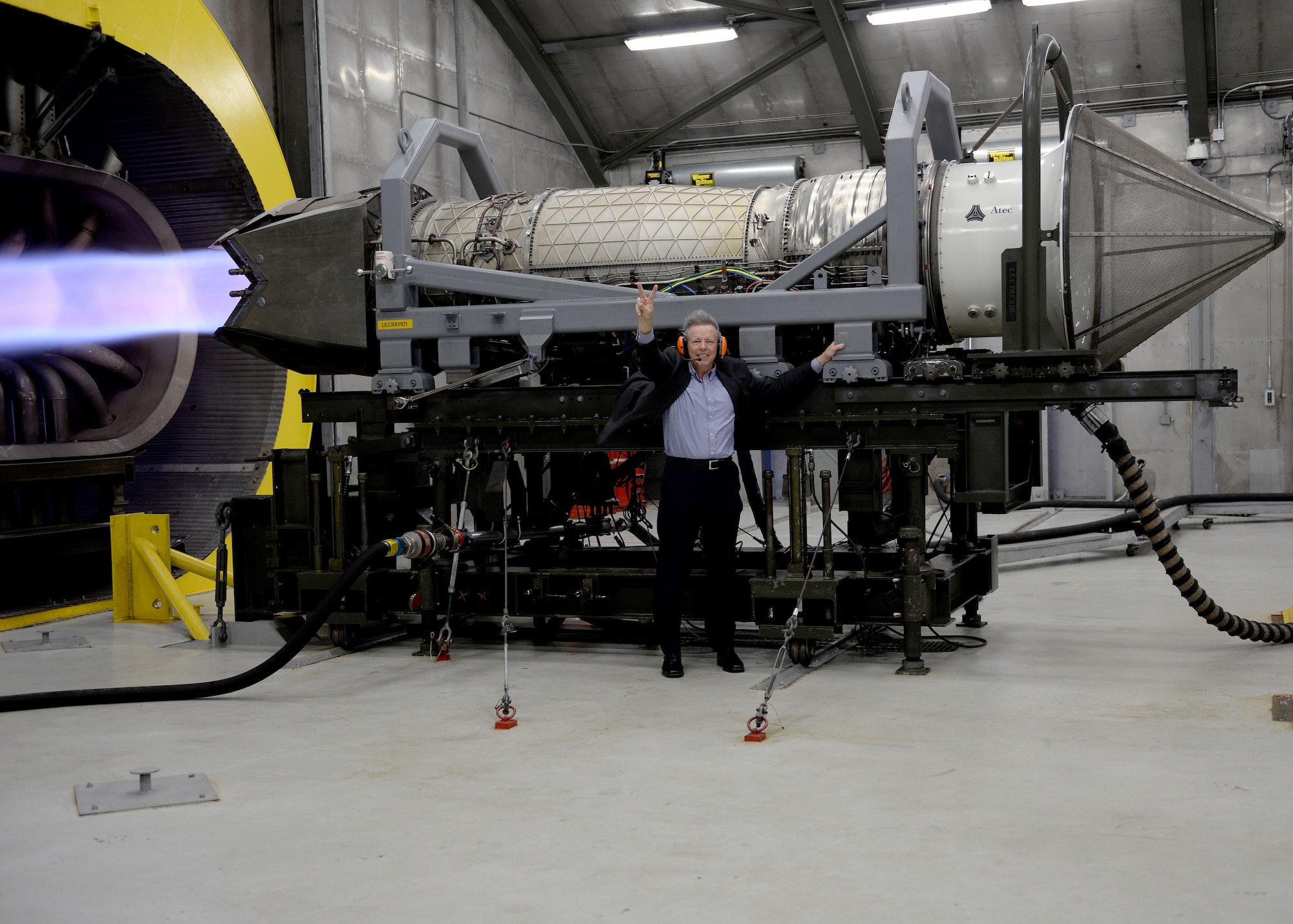 Retired U.S. Air Force Chief Master Sgt. of the Air Force Rodney J. McKinley holds on to an F-22 Raptor engine during a demonstration in the Hush House at Langley Air Force Base, Va., March 18, 2016. McKinley was introduced to the power of an F-22 Raptor engine and the newest technology that keeps them flying. (U.S. Air Force photo by Airman 1st Class Kaylee Dubois)
