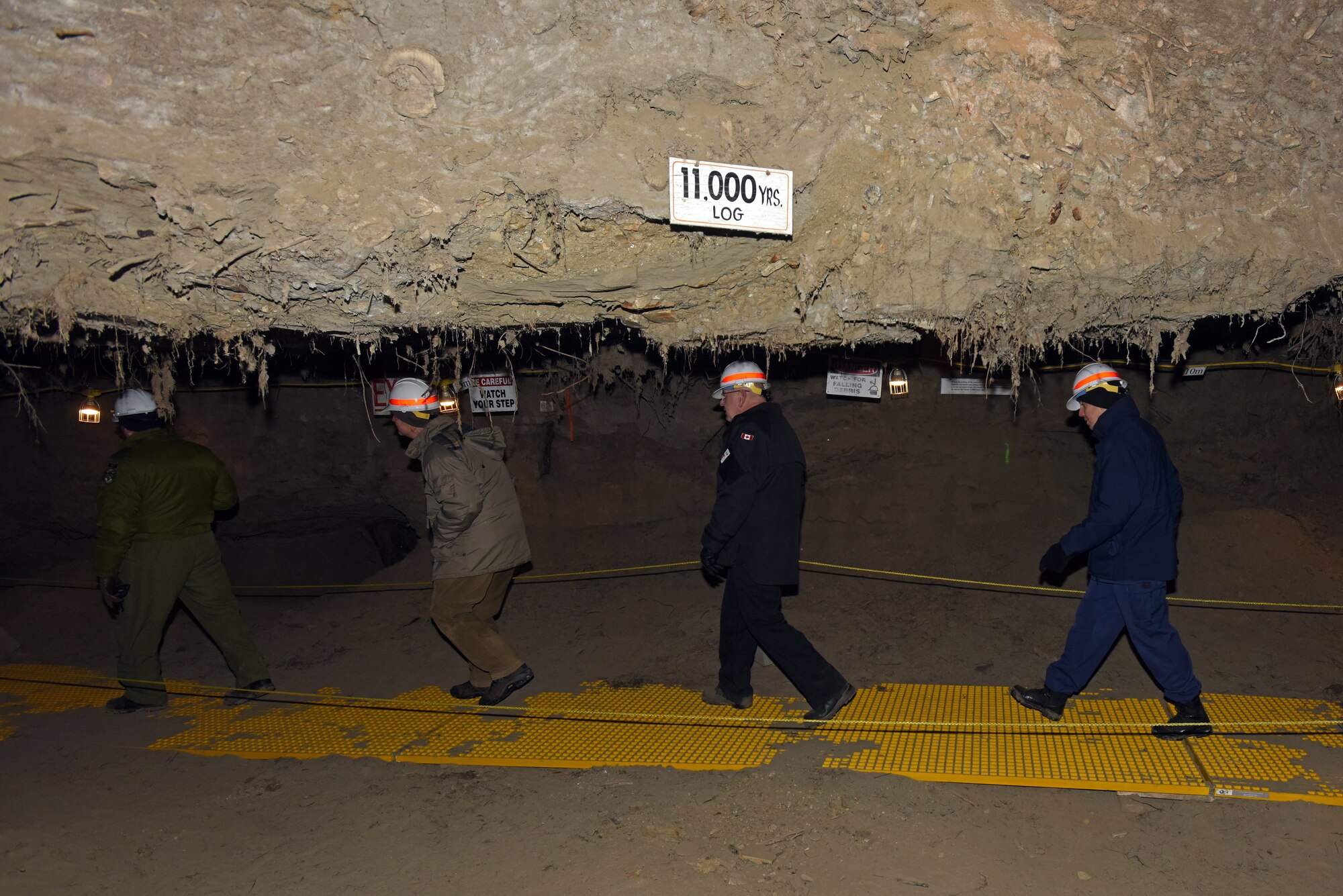 General Officer/Flag Officer summit attendees explore during the Permafrost Tunnel tour in Fox, Alaska, March 16. During the tour, attendees were informed on the consequences of Permafrost thawing and the impact it will have on infrastructure. The purpose of the annual GO/FO is to strengthen partnerships of senior military officers and enlisted leaders, joint and bi-national, as well as discuss current and future Arctic and Alaskan challenges and joint capabilities. (U.S. Air Force photo/Tech. Sgt. John Gordinier)