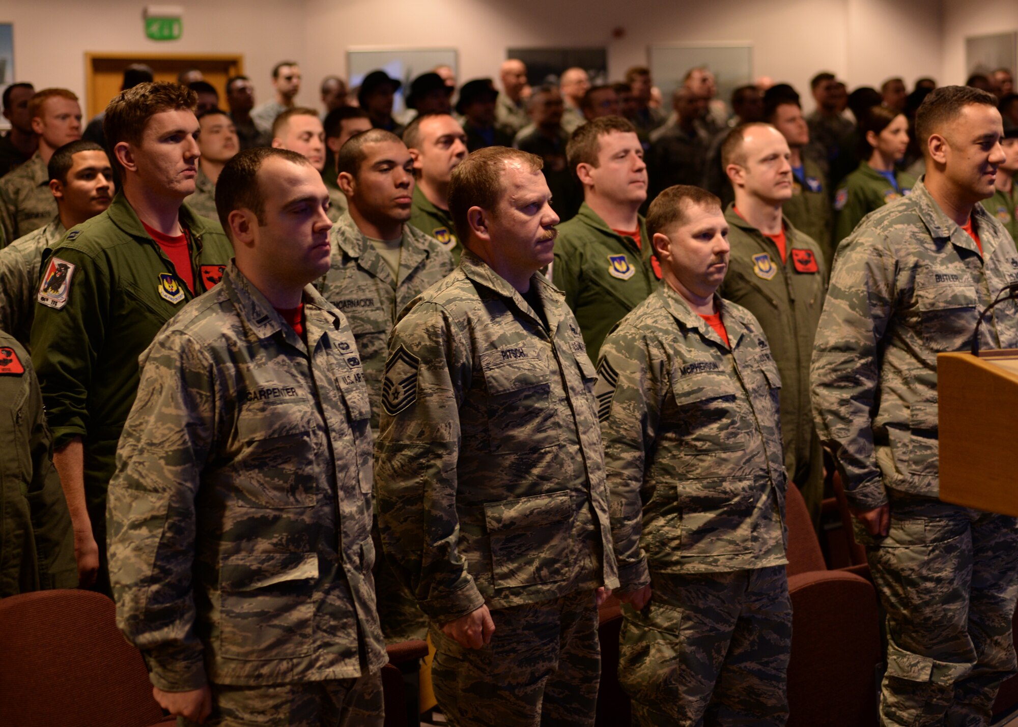 Thirty-three Liberty aircraft maintenance experts are inducted as the wings newest crop of dedicated crew chiefs, during a ceremony March 18, 2016 at Royal Air Force Lakenheath, England. The event serves as a milestone for these aircraft maintenance professionals, as they are each assigned a pilot and F-15E aircraft with their name on the canopy, which will be their personal responsibility for the rest of their tour. (U.S. Air Force photo/ Technical Sgt. Matthew Plew) 