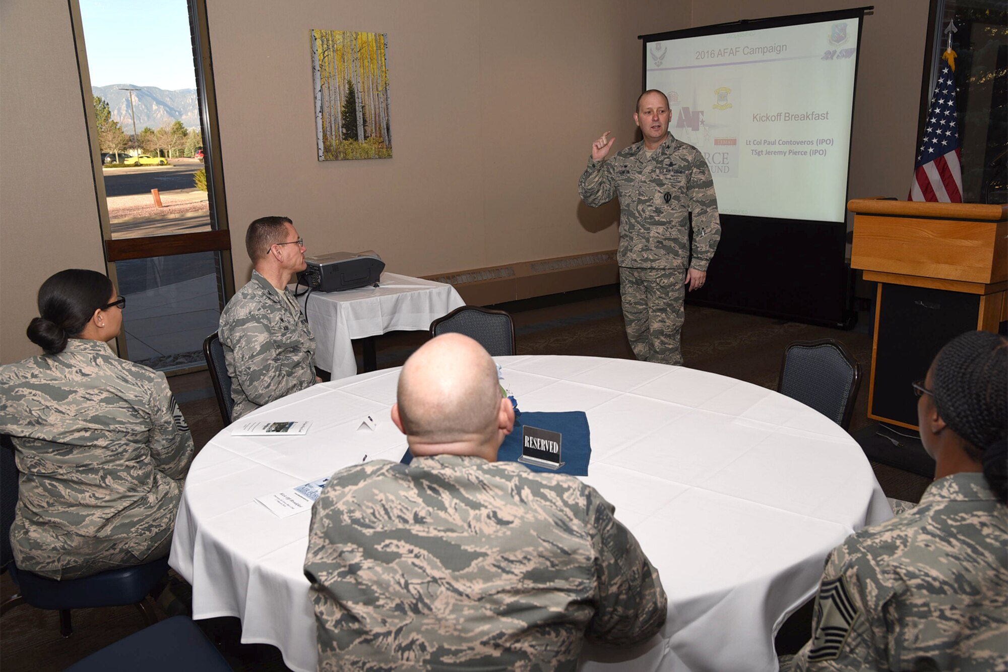 PETERSON AIR FORCE BASE, Colo. - Col. Douglas Schiess, 21st Space Wing commander, discusses the importance of the Air Force Assistance Fund during the kickoff breakfast at the Peterson Club on March 17, 2016. The AFAF mission is to raise funds to support the Air Force family.