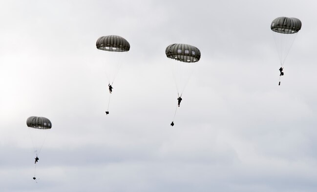 Members of the U.S. Army Reserve's 412th Civil Affairs Battalion, from Whitehall, Ohio, jump from 1250 feet out of a Marine Corps KC-130J from the 252 Marine Aerial Refueler Transport Squadron, Marine Aircraft Group 14, 2nd Marine Aerial Wing, Marine Corps Air Station, Cherry Point, North Carolina, over Wright-Patterson Air Force Base, Ohio, March 19, 2016. When deployed, the 412th conducts civil affairs operations in support of Central Command’s theater and task force commanders. Soldiers of the 412th Civil Affairs Battalion have been on the front lines of operations in Iraq, Afghanistan and in the Horn of Africa. (U.S. Air Force photo/WesleyFarnsworth)