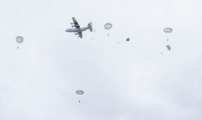 U.S. Army Reserve special operations soldiers from the 412th Civil Affairs Battalion from Whitehall, Ohio conduct a static line jump from 1,250 feet over Wright-Patterson Air Force Base, March 19, 2016. The soldiers jumped from a Marine Corps KC-130J from the 252 Marine Aerial Refueler Transport Squadron, Marine Aircraft Group 14, 2nd Marine Aerial Wing, Marine Corps Air Station, Cherry Point, North Carolina. (U.S. Air Force photo/Wesley Farnsworth)