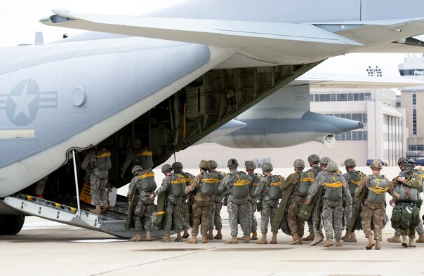Soldiers with the U.S. Army Reserve's, 412th Civil Affairs Battalion, from Whithall, Ohio, file onto a U.S. Marine Corps, KC-130J from the 252 Marine Aerial Refueler Transport Squadron, Marine Aircraft Group 14, 2nd Marine Aerial Wing, Marine Corps Air Station, Cherry Point, North Carolina, to conduct a jump over Wright-Patterson Air Force Base, Ohio, March 19, 2016. Several units from around Wright-Patterson AFB provided support for the exercise. (U.S. Air Force photo/Wesley Farnsworth)