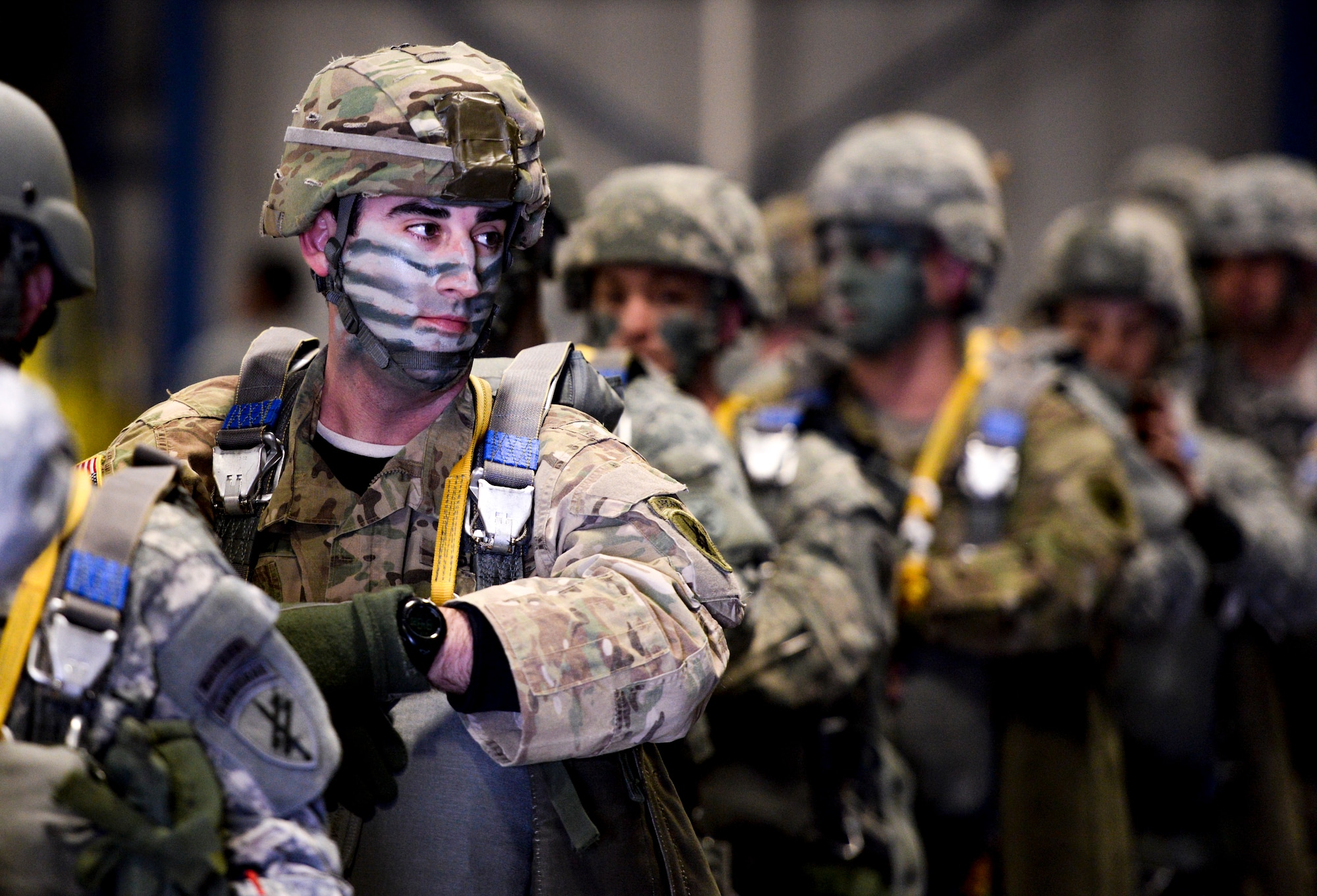 U.S. Army Reserve Maj. Jay Favuzzi, 412th Civil Affairs Battalion civil-military operations center chief, stands in line while waiting to walk to a U.S. Marine Corps KC-130J to conduct a jump over Wright-Patterson Air Force Base, Ohio, March 19, 2016. The KC-130J aircraft are from the 252 Marine Aerial Refueler Transport Squadron, Marine Aircraft Group 14, 2nd Marine Aerial Wing, Marine Corps Air Station, Cherry Point, North Carolina. (U.S. Air Force photo/Wesley Farnsworth) 