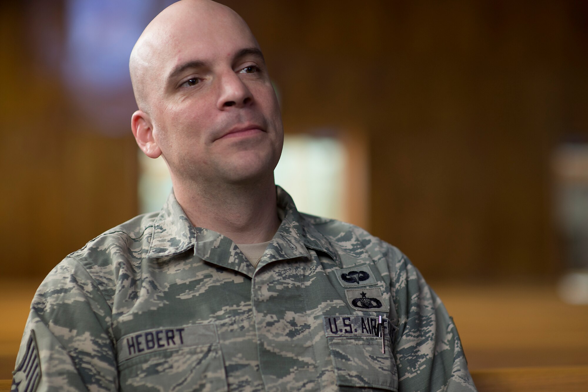Tech. Sgt. Aleric Hebert, 374th Wing Staff Agency chapel NCO in charge of resource management, poses for a portrait photo at Yokota Air Base, Japan, Jan. 28, 2016. Members of the chaplain assistant career field are trained to provide crisis intervention and provide 100 percent confidentiality. (U.S. Air Force photo by Senior Airman David C. Danford/Released)
