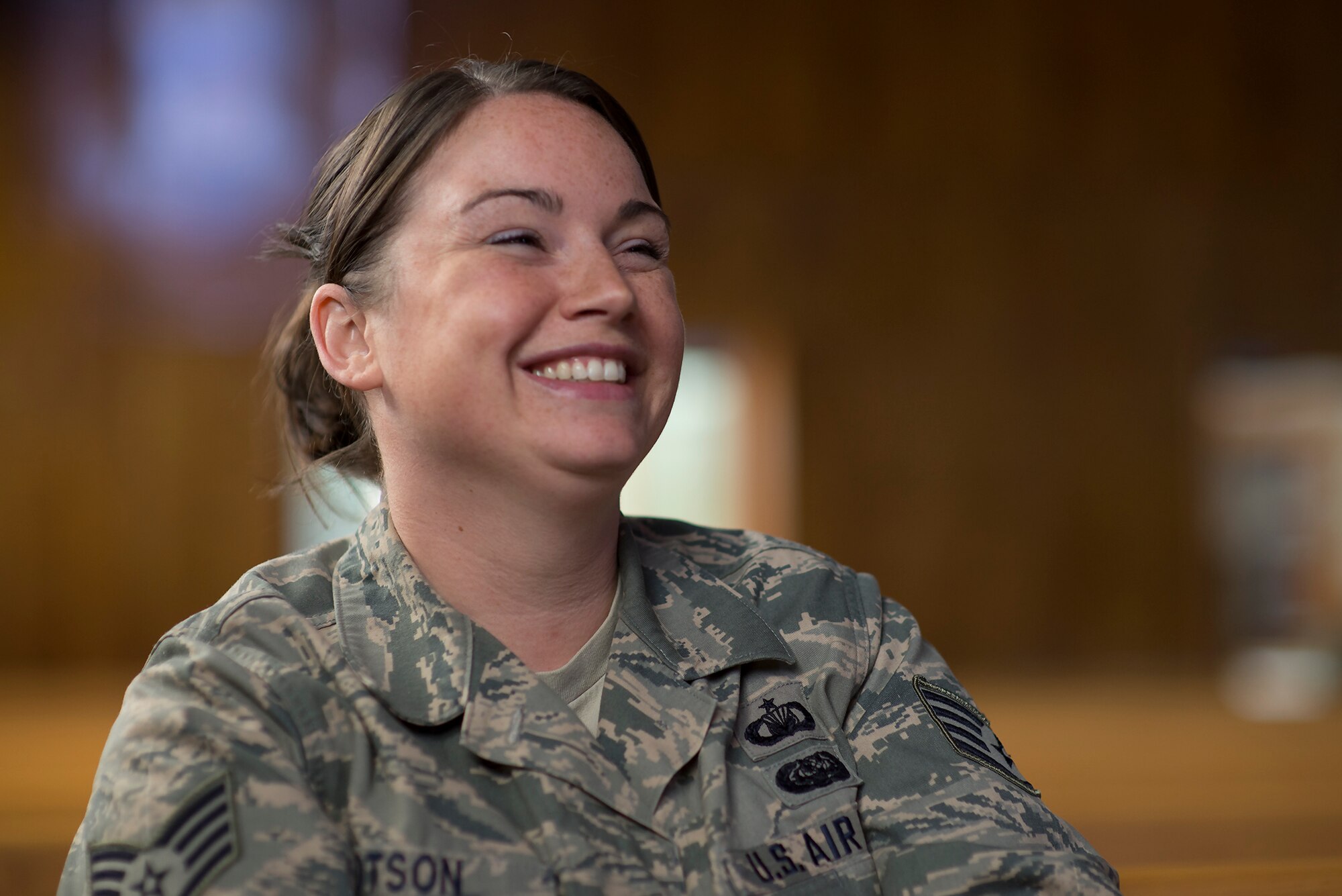 Staff Sgt. Angela Dotson, 374th Wing Staff Agency chapel NCO in charge of readiness and training, poses for a portrait photo at Yokota Air Base, Japan, Jan. 28, 2016. Members of the chaplain assistant career field are trained to provide crisis intervention and provide 100 percent confidentiality. (U.S. Air Force photo by Senior Airman David C. Danford/Released)