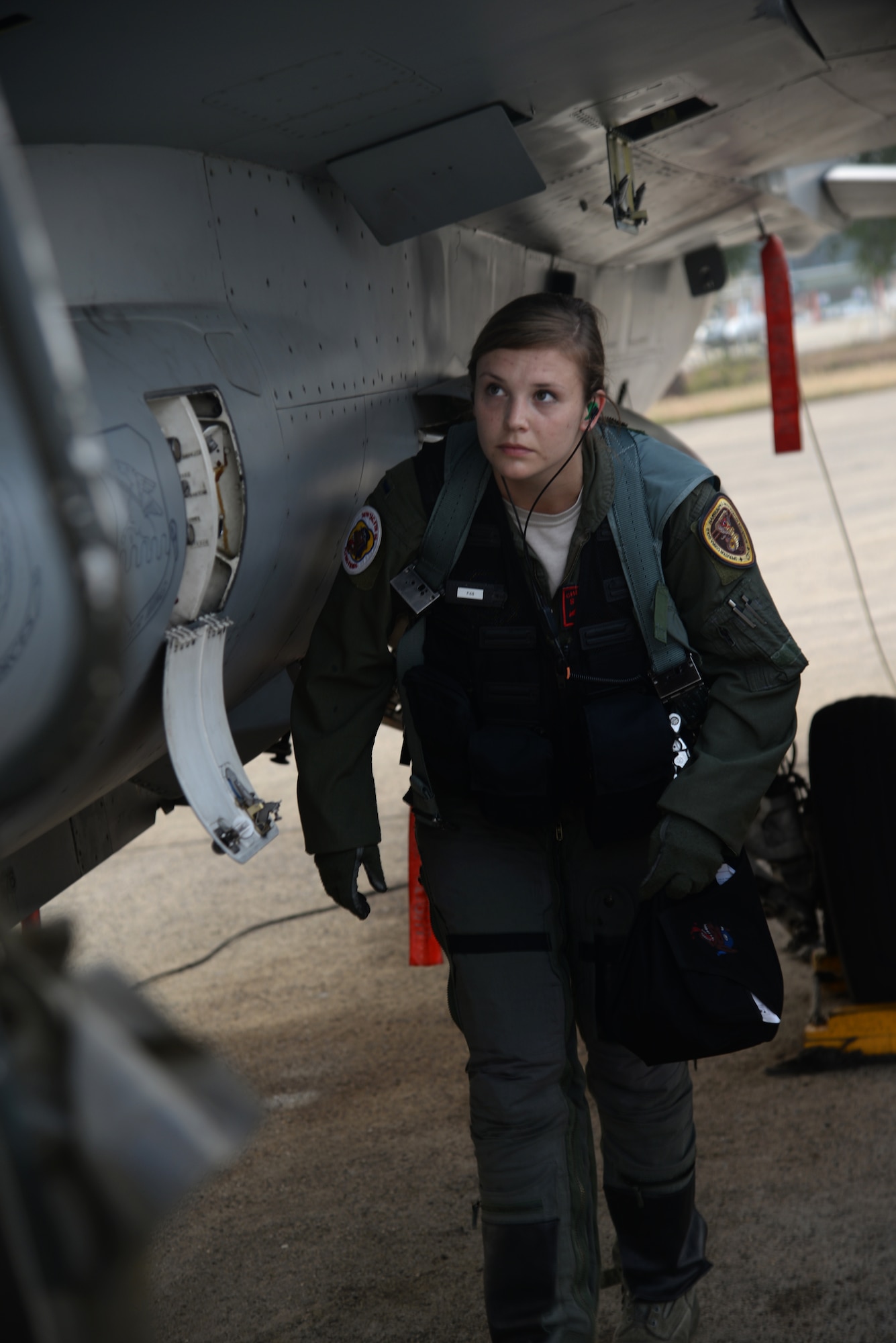 U.S. Air Force 1st Lt. Brittany Trimble, 36th Fighter Squadron pilot, does a preflight inspection of an F-16 Fighting Falcon before takeoff, Feb. 15, 2016, at Korat Royal Thai Air Force Base, Thailand. Trimble is one of only 676 female pilots who serve in the U.S. Air Force. There are 12,823 pilots Air Force wide. (U.S. Air Force photo by Staff Sgt. Amber E. Jacobs)