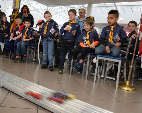 RAF Mildenhall Cub Scout Pack 215 hosts the Pinewood Derby March 19, 2016, on RAF Mildenhall, England. Scouts entered their handmade pinewood race cars in a tournament to determine whose racer was the fastest. The race was organized to put the winners of each heat head to head in the championships. (U.S. Air Force photo by Senior Airman Justine Rho/Released) 