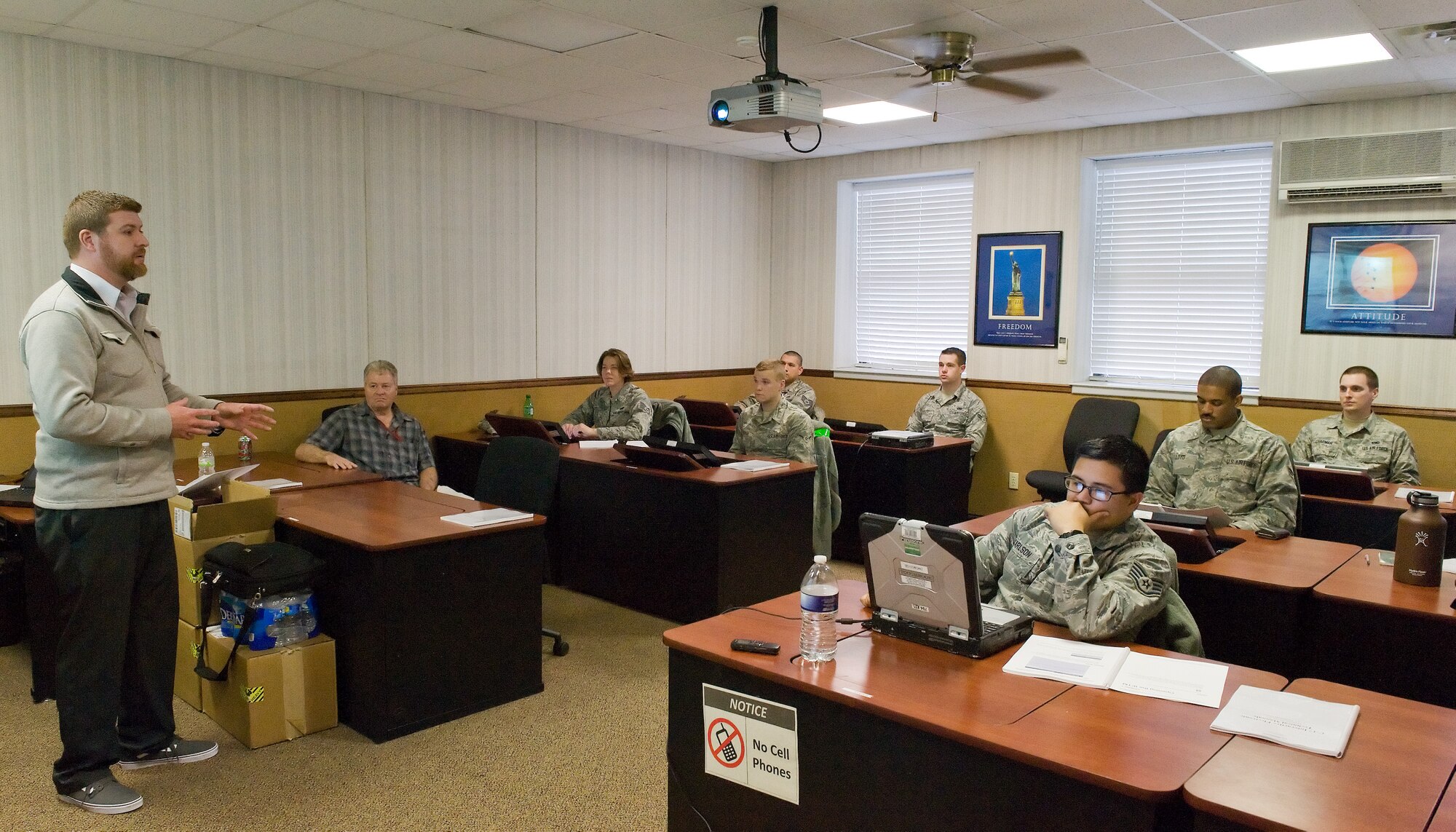 Van Holland, Boeing Company, C-17 Lifecycle Support, left, instructs C-17A Globemaster III maintainers on how to navigate through the current C-17 Interactive Electronic Technical Manual on their e-tools Feb. 24, 2016, on Dover Air Force Base, Del. Holland, part of a five-member team from the Air Force Materiel Command, Air Force Life Cycle Management Center, C-17 Technical Order Management Agency, Robins Air Force Base, Georgia, provided over 140 active duty, reserve and civilian Dover Globemaster III maintainers from various specialties with 13 four-hour classroom instruction during a four-day period. (U.S. Air Force photo/Roland Balik)
