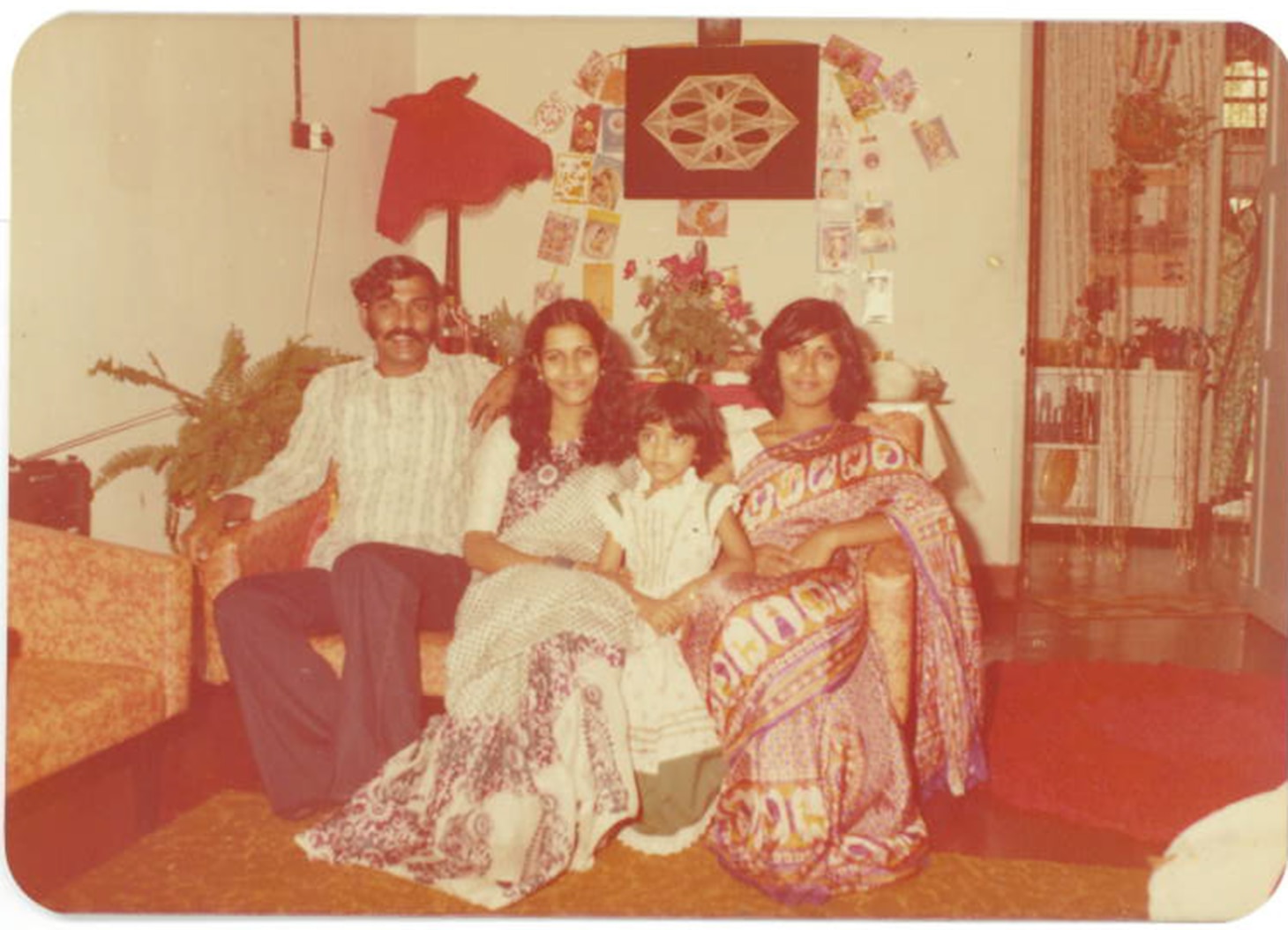 160314-N-IE405-001 PERAK, Malaysia (Mar. 14, 2016) - Mass Communication Specialist 2nd Class Indra Bosko, assigned to U.S. 7th Fleet, poses with her family at age 3. (Photographer Unknown).