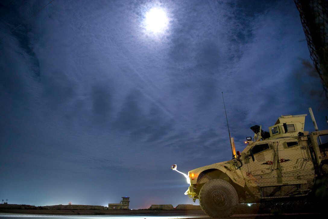 Airmen park their mine-resistant, ambush-protected, all-terrain vehicle after a patrol near the Russian Ruins at Bagram Airfield, Afghanistan, March 23, 2016. The airmen are assigned to the 455th Expeditionary Security Forces Squadron Flightline Security Quick Reaction Force team. Air Force photo by Tech. Sgt. Robert Cloys