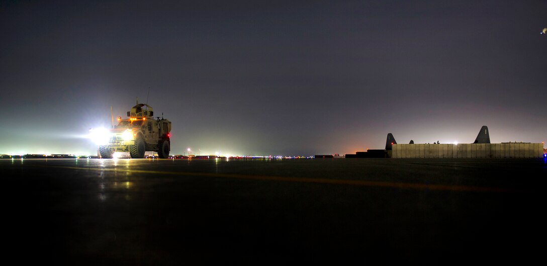 Air Force airmen park their vehicles on the flightline at Bagram Airfield, Afghanistan, March 23, 2016. Air Force photo by Tech. Sgt. Robert Cloys