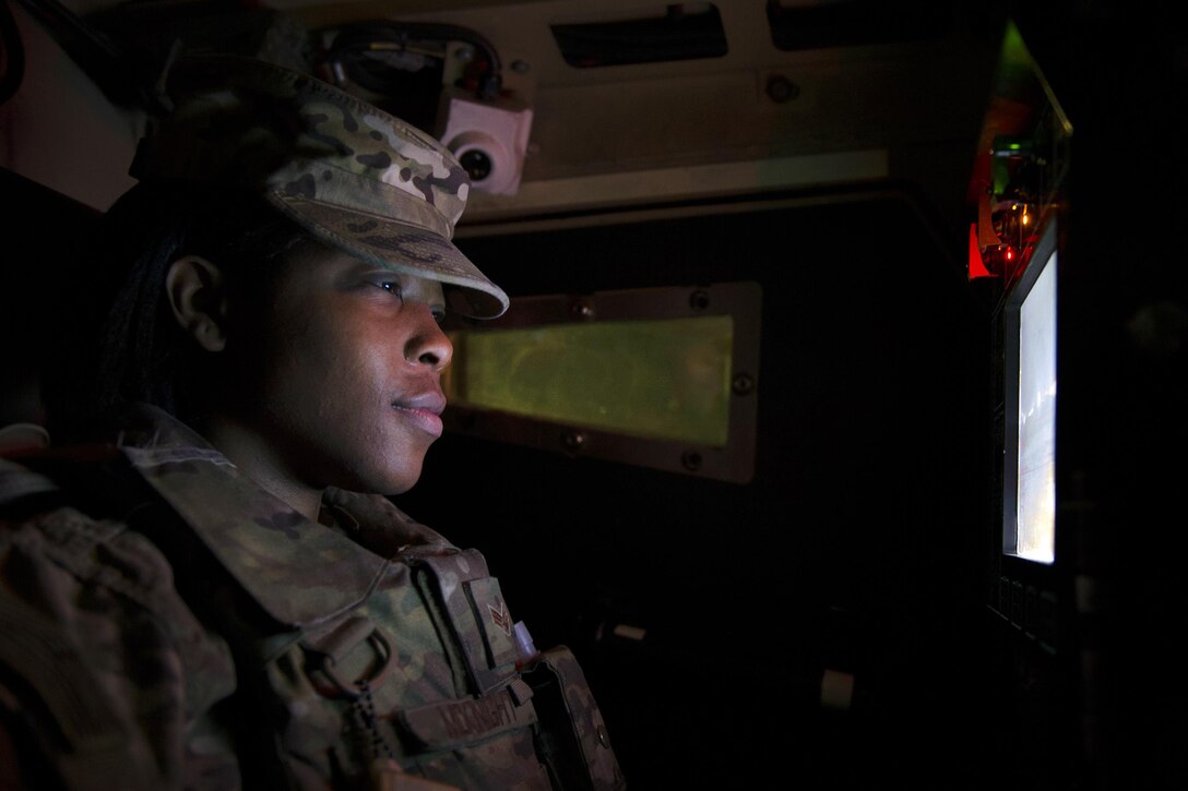 Senior Airman Teniesha Mcknight operates a remote operating weapons station inside a mine-resistant, ambush-protected, all-terrain vehicle during a patrol at Bagram Airfield, Afghanistan, March 23, 2016. McKnight is assigned to the 455th Expeditionary Security Forces Squadron Flightline Security Quick Reaction Force team. Air Force photo by Tech. Sgt. Robert Cloys