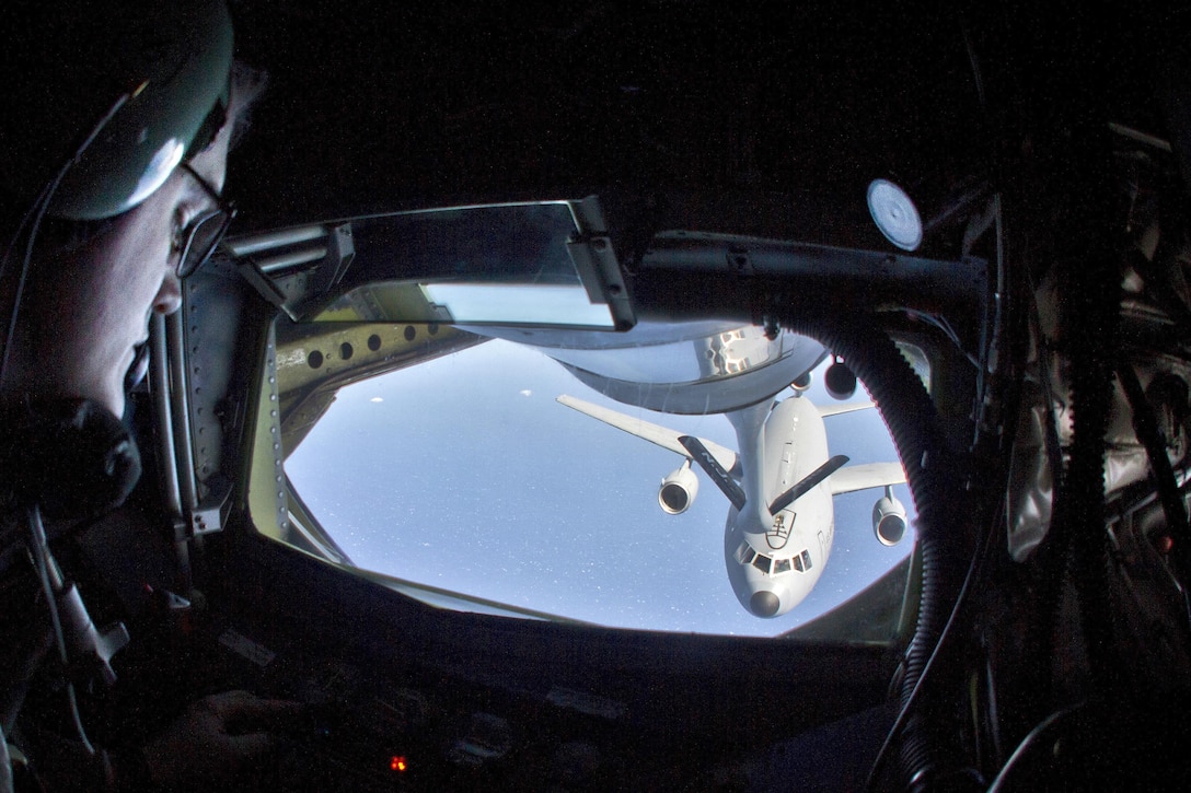 Airman 1st Class Connor Smith refuels a KC-10 Extender over the Atlantic Ocean, March 18, 2016. Smith is a boom operator assigned to the New Jersey Air National Guard's 108th Wing. New Jersey Air National Guard photo by Tech. Sgt. Matt Hecht