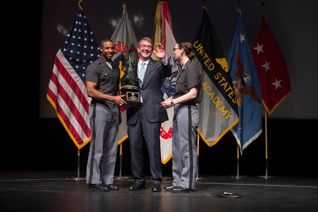 Defense Secretary Ash Carter is presented a gift from cadets during his visit to the U.S. Military Academy in West Point, N.Y., March 23, 2016. DoD photo by Petty Officer 1st Class Tim D. Godbee