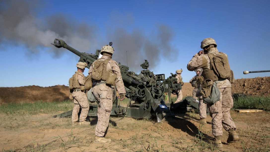 U.S. Marines with Task Force Spartan, 26th Marine Expeditionary Unit (MEU), on Fire Base Bell, Iraq, fire an M777A2 Howitzer at an ISIS infiltration route March 18, 2016. The Marines fired upon the enemy infiltration routes in order to disrupt their freedom of movement and ability to attack Kurdish and Peshmerga forces. Operation Inherent Resolve is an international U.S.
led coalition military operation created as part of a comprehensive strategy to degrade and defeat the Islamic State of Iraq and the Levant.