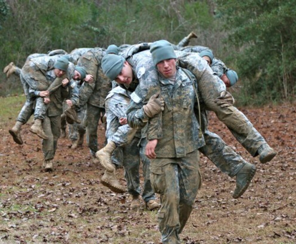 Some reserve-component Soldiers will soon be training more closely and more often with active units in a new pilot program. Shown here are Soldiers training at Fort Polk, La.