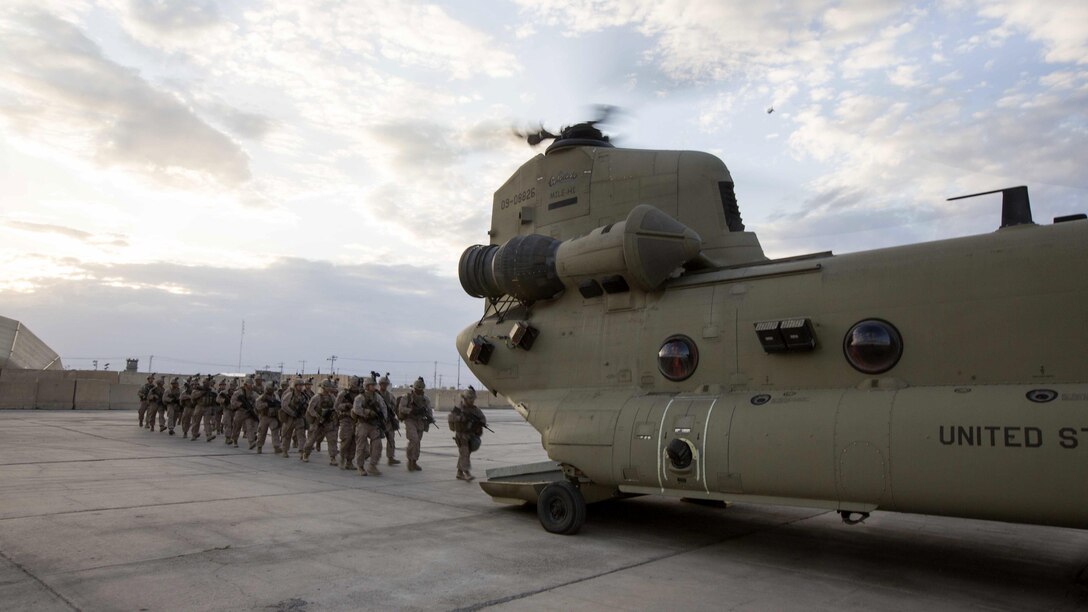 U.S. Marines with Task Force Spartan, 26th Marine Expeditionary Unit, board a CH-47 Chinook helicopter in Taji, Iraq, before heading to Kara Soar for their mission in support of Operation Inherent Resolve on March 17, 2016. Operation Inherent Resolve is an international U.S. led coalition military operation created as part of a comprehensive strategy to degrade and defeat the Islamic State of Iraq and the Levant.
