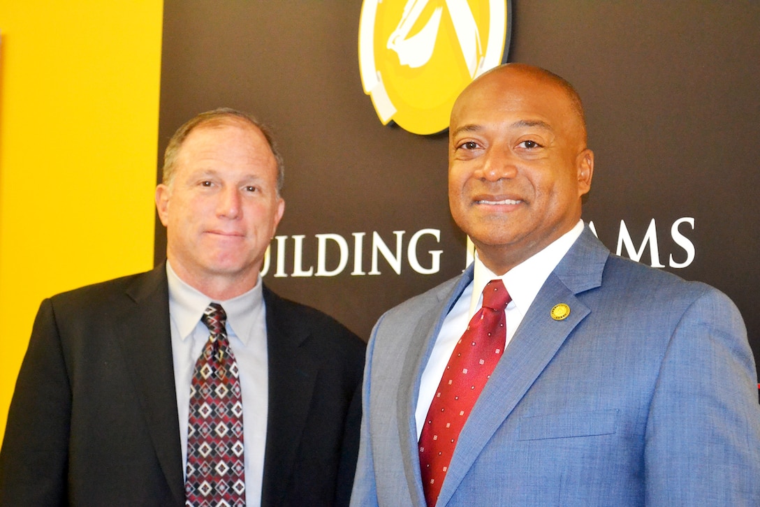 Michael Rector (left), DLA Joint Contingency Acquisition Support Office lead planner, and William Sanders, U.S. Central Command director of contracting support, learned about the vetting process for DLA Troop Support contracts in the CENTCOM area of responsibility March 16.