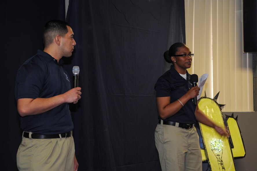 U.S. Air Force Staff Sgt. Alfred Ramirez, 355th Force Support Squadron fitness assessment cell NCO in charge, and Senior Airman Jasmin Martin, 355th FSS fitness assessment cell assistant NCOIC,  present their proposal during the #InnovateDLT event held at Davis-Monthan Air Force Base, Ariz., Jan. 29, 2016. The event gave Airmen an opportunity to pitch their innovative ideas to the base commander and a panel of judges. (U.S. Air Force photo by Airman 1st Class Mya M. Crosby/Released)