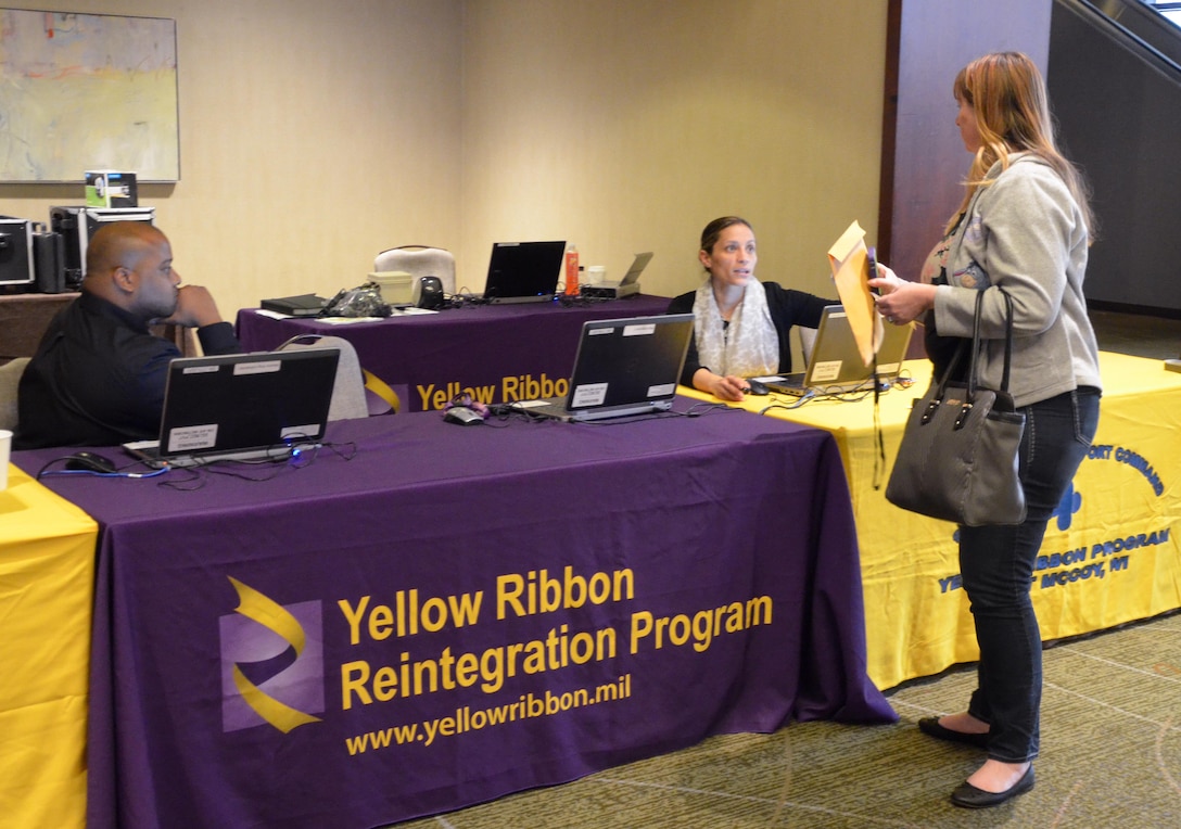 Soldiers and Family members register and receive welcome packets for the 88th Regional Support Command Yellow Ribbon Reintegration Program Event in downtown Minneapolis, Minn., March 18. The Yellow Ribbon Reintegration Program is a DoD-wide effort to promote the well-being of National Guard and Reserve members, their families and communities, by connecting them with resources throughout the deployment cycle. Through Yellow Ribbon events, service members and loved ones connect with local resources honoring veterans and families before, during and after deployments.