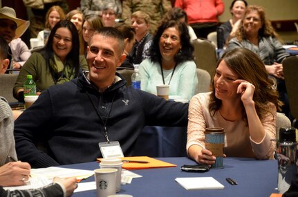 Soldiers and Family members participate in group discussions during a training class at the 88th Regional Support Command Yellow Ribbon Reintegration Program Event in downtown Minneapolis, Minn., March 18. The Yellow Ribbon Reintegration Program is a DoD-wide effort to promote the well-being of National Guard and Reserve members, their families and communities, by connecting them with resources throughout the deployment cycle. Through Yellow Ribbon events, service members and loved ones connect with local resources honoring veterans and families before, during and after deployments.