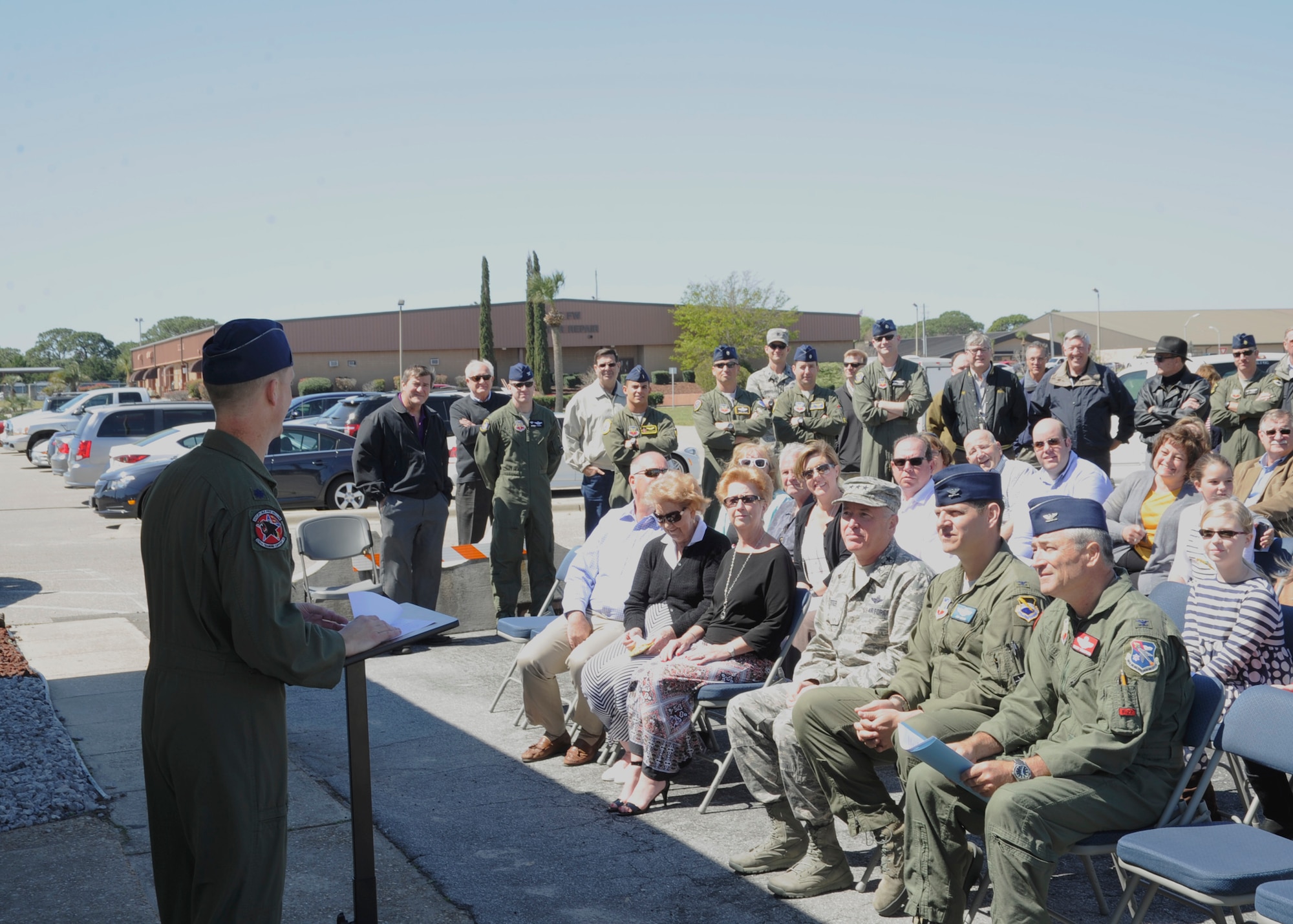 Lieutenant Colonel Matthew Zamiska, 325th Training Support Squadron commander, addresses attendees of the Kemp Pilot Gym dedication March 21, at Tyndall, Air Force Base, Fla. The purpose of this event was to dedicate the gym to the memory of Col. Larry “Pinball” Kemp. (U.S. Air Force photo by Senior Airman Solomon Cook/Released)