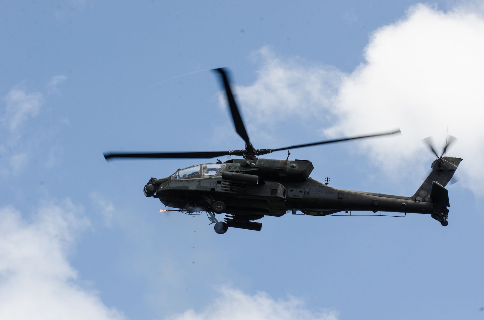 A U.S. Army AH-64 Apache helicopter crew assigned to the 48th Infantry Brigade Combat Team (IBCT), fires the M230 130mm chain gun at targets in a combined arms live-fire exercise during the 48th IBCT's eXportable Combat Training Capability (XCTC) rotation at Fort Stewart, Georgia, Sept. 19, 2013. 
