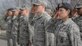 Airman Leadership School Class 16-D students salute the colors as it is lowered during a retreat ceremony at Vance Air Force Base, Oklahoma, March 14. ALS students are required to complete a retreat ceremony as part of their Airmanship tasks. (U.S. Air Force photo/ David Poe)