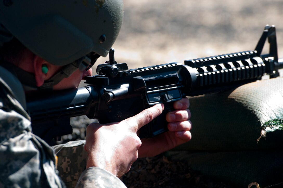 A Soldier pauses in the ready position on a firing range at Fort Jackson, S.C. on March 22, during the combined Best Warrior and Drill Sergeant of the Year competitions for the 108th Training Command (Initial Entry Training). This year's Best Warrior competition will determine the top noncommissioned officer and junior enlisted Soldier who will represent the 108th Training Command (IET) in the Army Reserve Best Warrior competition later this year at Fort Bragg, N.C. This year's Drill Sergeant of the Year competition will determine the top two drill sgts. who will compete in the TRADOC Drill Sgt. of the Year competition later this year at Fort Jackson, S.C. (U.S. Army photo by Maj. Michelle Lunato/released)