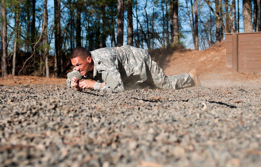 Sgt. 1st Class Joshua Moeller, 95th Training Division (Initial Entry Training), maneuvers through an obstacle course at Fort Jackson, S.C., on March 23, as part of the Best Warrior competition for the 108th Training Command (IET). This year's Best Warrior competition will determine the top noncommissioned officer and junior enlisted Soldier who will represent the 108th Training Command (IET) in the Army Reserve Best Warrior competition later this year at Fort Bragg, N.C. (U.S. Army photo by Maj. Michelle Lunato/released)