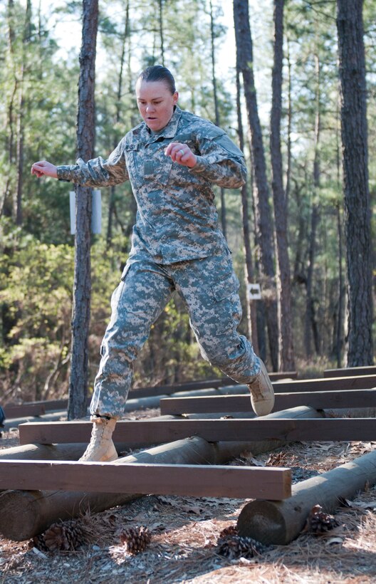 Spc. Amber Robinson, 95th Training Division (Initial Entry Training), manuevers through an obstacle course at Fort Jackson, S.C., on March 23, as part of the Best Warrior competition for the 108th Training Command (IET). This year's Best Warrior competition will determine the top noncommissioned officer and junior enlisted Soldier who will represent the 108th Training Command (IET) in the Army Reserve Best Warrior competition later this year at Fort Bragg, N.C. (U.S. Army photo by Maj. Michelle Lunato/released)