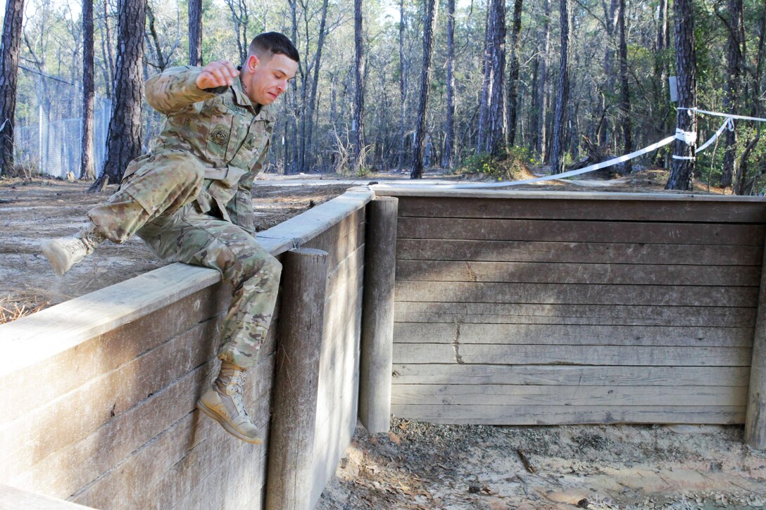 Sgt. Nicholas Contestabile, 98th Training Division (Initial Entry Training), maneuvers through an obstacle course at Fort Jackson, S.C., on March 23, as part of the Best Warrior competition for the 108th Training Command (IET). This year's Best Warrior competition will determine the top noncommissioned officer and junior enlisted Soldier who will represent the 108th Training Command (IET) in the Army Reserve Best Warrior competition later this year at Fort Bragg, N.C. (U.S. Army photo by Maj. Michelle Lunato/released)