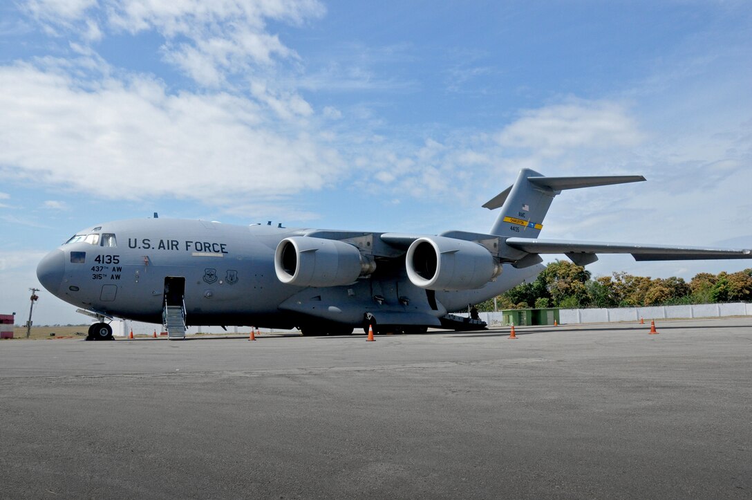 A C-17 Globemaster III on the ramp in Havana, Cuba for a presidential support mission flown by a reserve crew from the 701st Airlift Squadron at Joint Base Charleston, SC.  The diplomatic mission was the first time a sitting U.S. president has visited the communist nation in 88 years.  (U.S. Air Force photo by Maj. Wayne Capps)