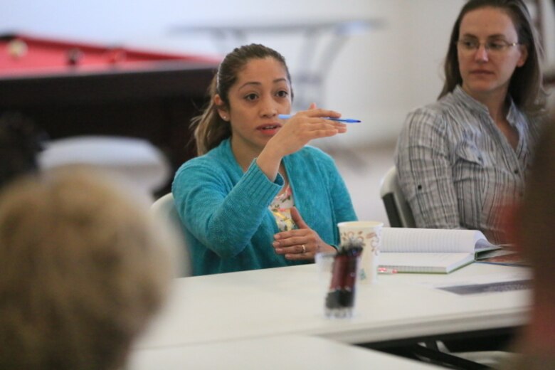 Soraya Feliciano, wife of Staff Sgt. Anthony Feliciano, intelligence analyst, Unmanned Aerial Vehicle Squadron 1, talks to members of the Resident Advisory Board during the  board’s meeting at the Ocotillo Club House, March 17, 2016. (Official Marine Corps photo by Cpl. Julio McGraw/Released)