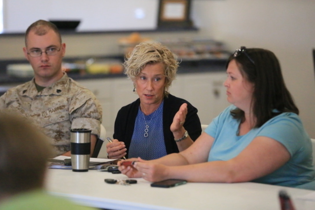 Laurie Craparotta, wife of Maj. Gen. Lewis A. Craparotta, Combat Center Commanding General, speaks to a member of the Resident Advisory Board during the boards’ meeting at the Ocotillo Club House, March 17, 2016. The RAB began March 2015, and was designed to promote the sharing of information to resolve issues and facilitate positive changes, to improve the quality of life for service members and their families who live in base housing. (Official Marine Corps Photo by Cpl. Julio McGraw/Released)