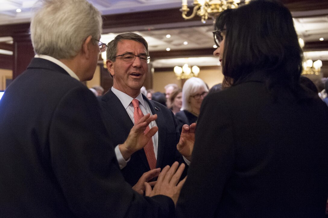 Defense Secretary Ash Carter, center, talks with guests as they arrive for the Center for the Study of the Presidency and Congress Eisenhower awards dinner in Washington, D.C., March 23, 2016, where he received the Eisenhower Award for leadership in national security affairs. DoD photo by Senior Master Sgt. Adrian Cadiz