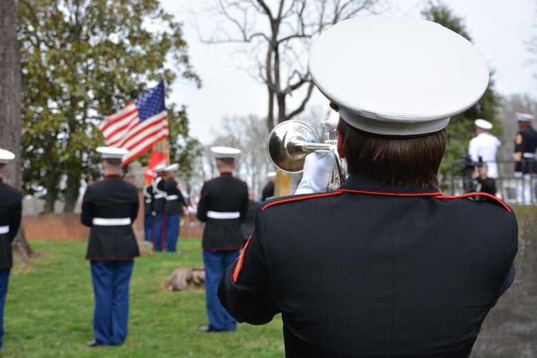 Sgt. Lindsay Bender, Marine Corps Base Quantico Band, plays Taps with her bugle during the annual James Madison Wreath-Laying Ceremony held at Montpelier, March 16.